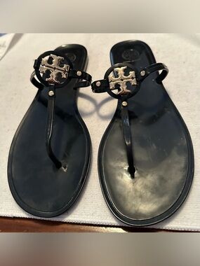 Tory Burch Black Jelly Logo Thong Sandals with Gold Emblem
